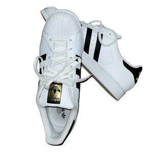 Adidas Classic White and Black Sneakers with Gold Accent